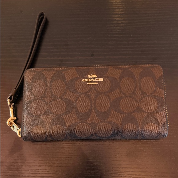 Coach Handbags - Coach Dark Brown Signature Wristlet